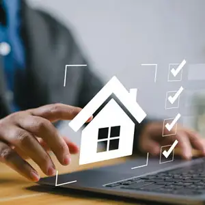 Hands on laptop with house and checklist icons, resolving real estate disputes and property conflicts.
