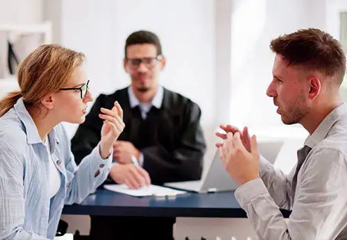 A couple consulting with a family lawyer; understanding how Attorney Mancebo helps with divorce.